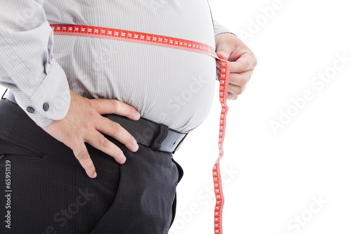 Canvas Print fat business man use scale to measure his waistline