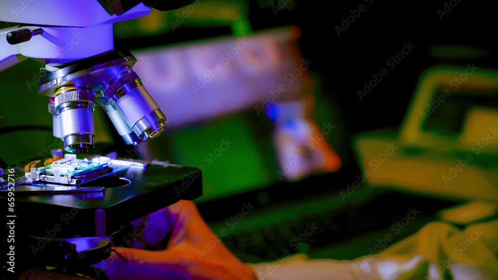 check micro electronic chip under a microscope