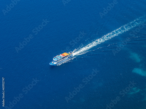 Aerial view of ferry boat in open waters in Greece © Netfalls