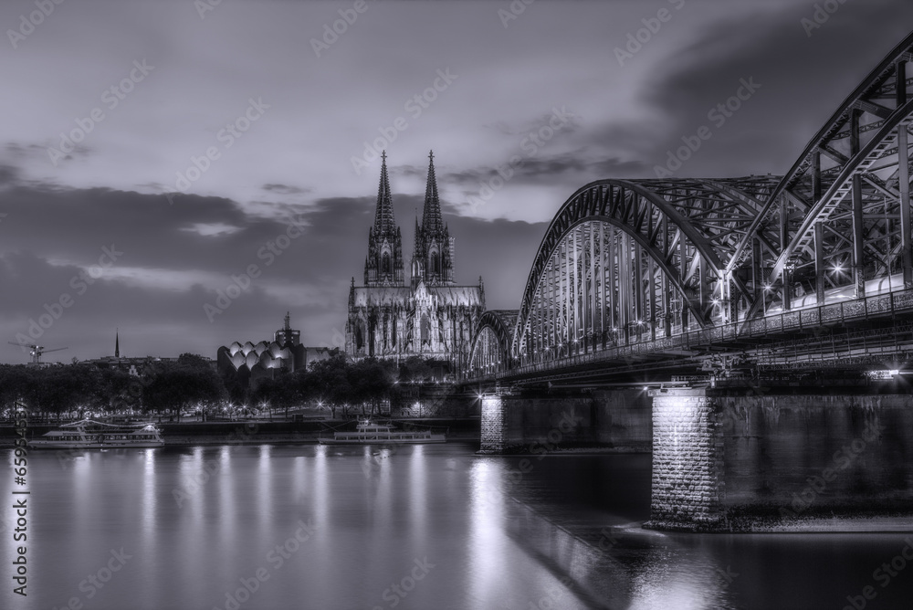 Cologne Cathedral and bridge at night
