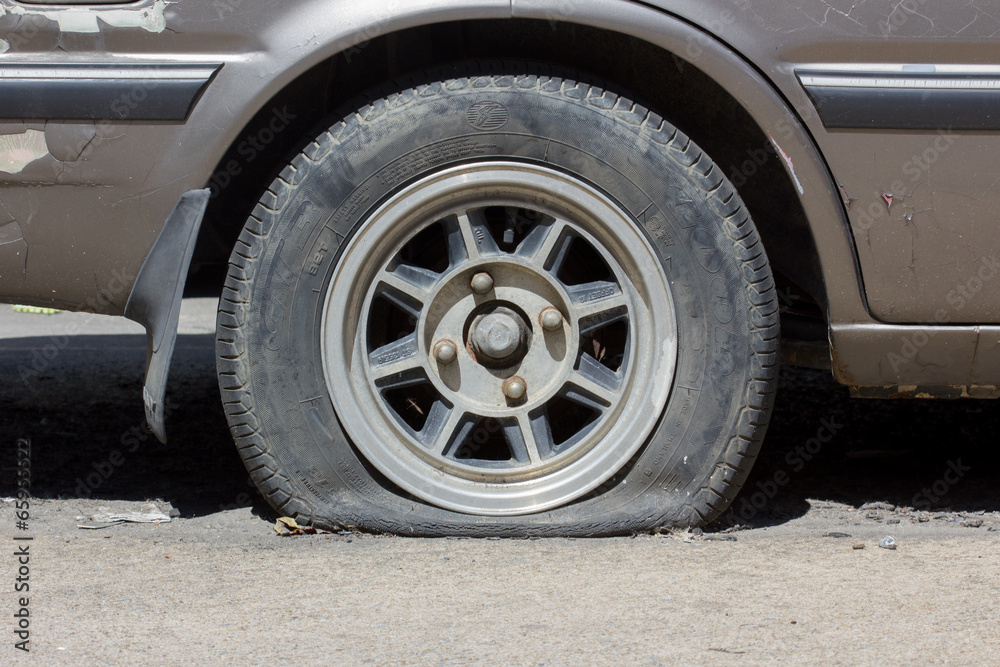 flat tyre in sunshine