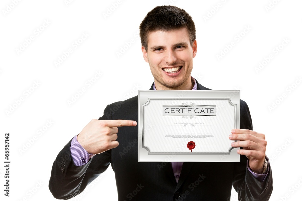 Smiling young business man,showing a certificate.