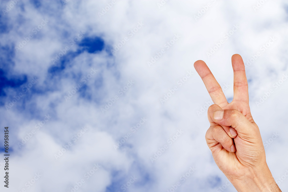 hand on background of sky and clouds hand on background of sky and clouds