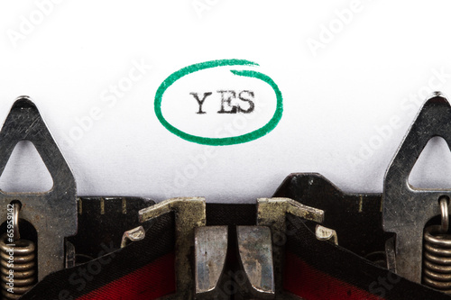 Typewriter with text yes