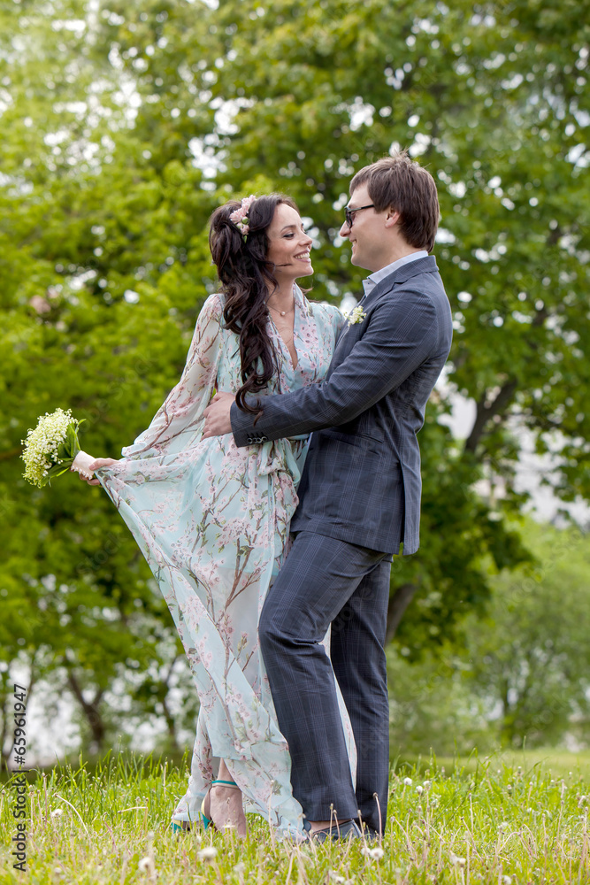Naklejka premium Bride and groom before the wedding. Happy newlywed couple