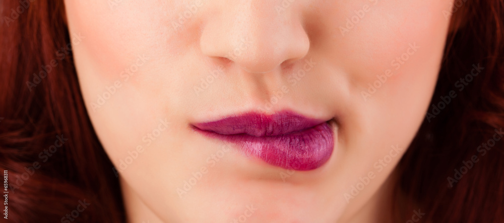 Fototapeta premium Beautiful woman red lips close up