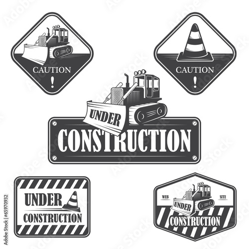 Set of under construction emblems, labels and designed elements