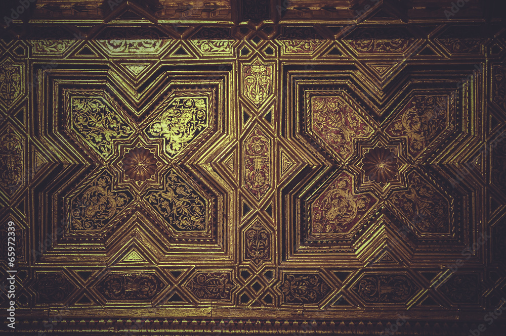 wood paneling covered with gold leaf