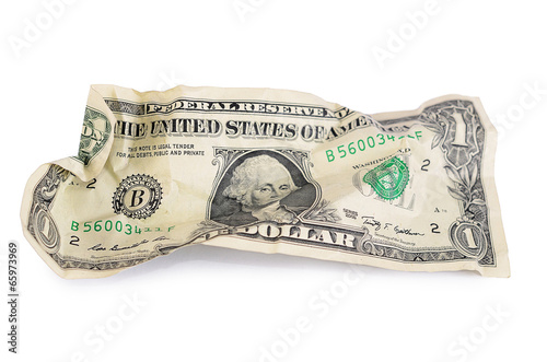 The crumpled dollar bills isolated