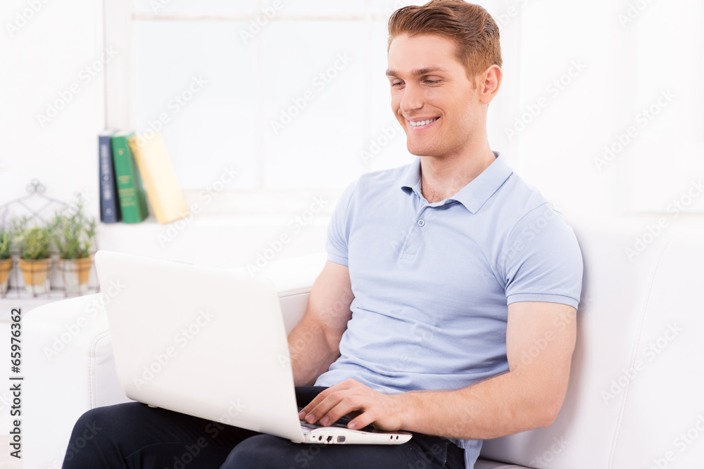 Surfing the net at home.