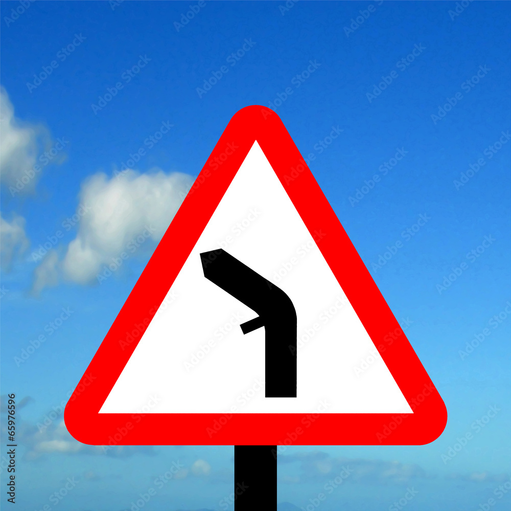 Warning triangle junction on a bend traffic sign Warning triangle junction on a bend traffic sign