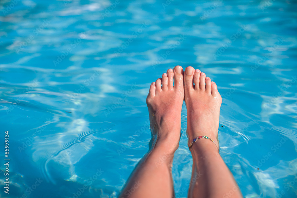 Close-up of a woman's foot in the water