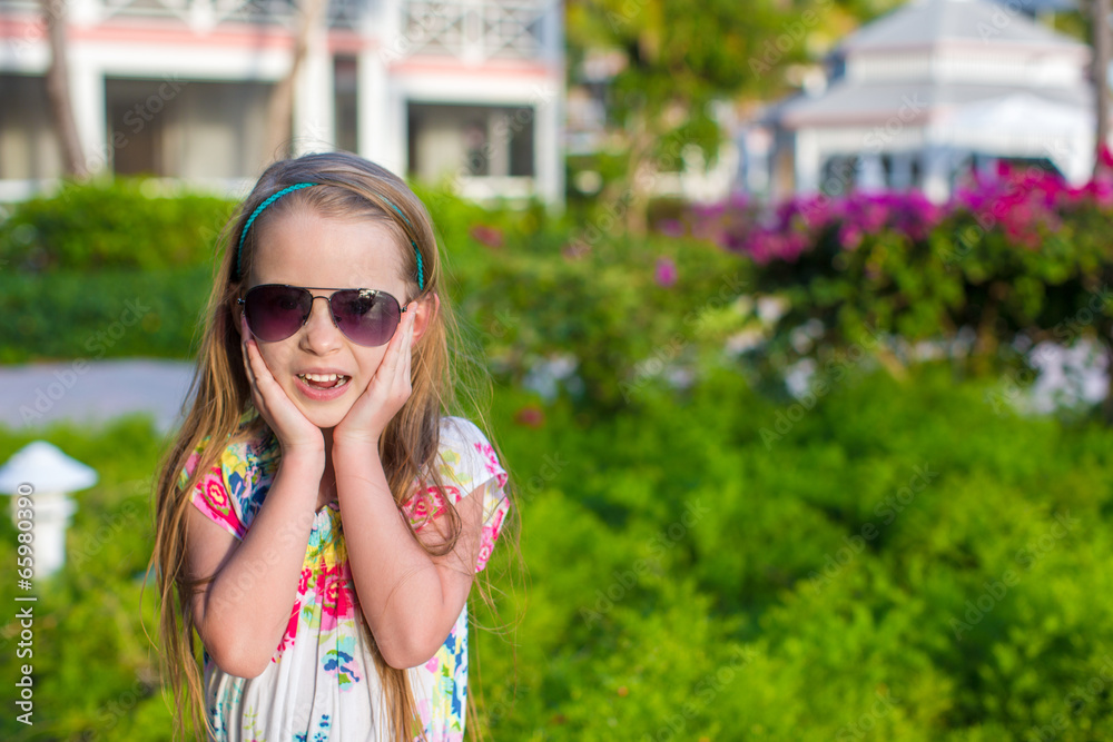 Surprised little girl on summer vacation Surprised little girl on summer vacation