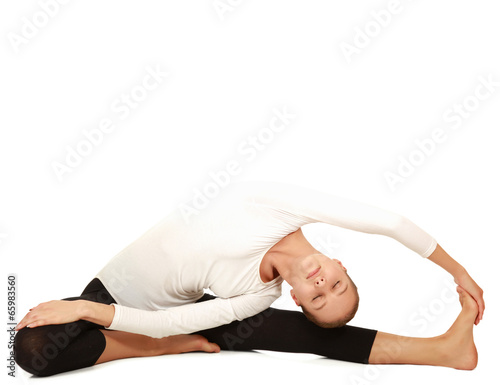 Gymnast girl in flexible back pose, isolated on white background