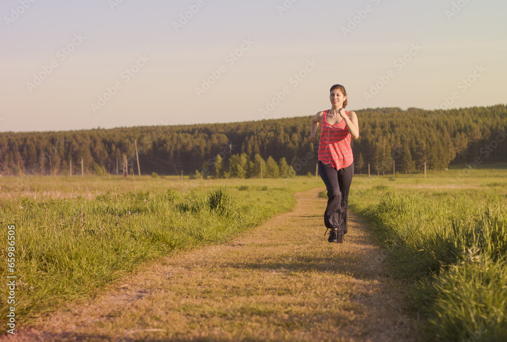 fit sports woman jogging at park