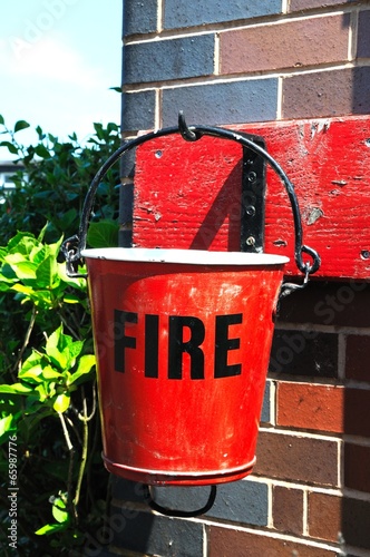 Old red fire bucket © Arena Photo UK photo