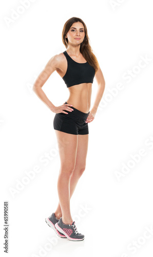 Young athletic girl on white