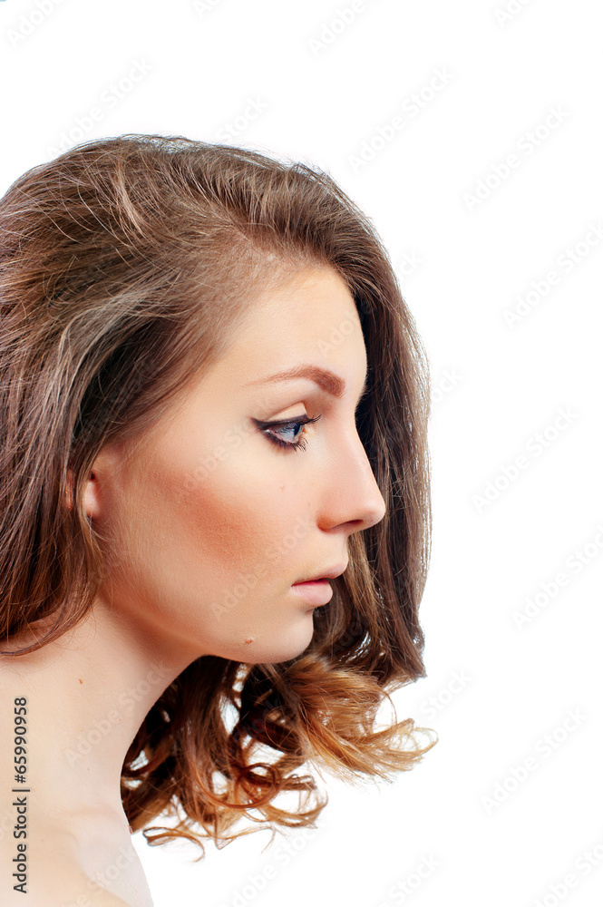 Profile of a beautiful young woman with evening make-up Profile of a beautiful young woman with evening make-up