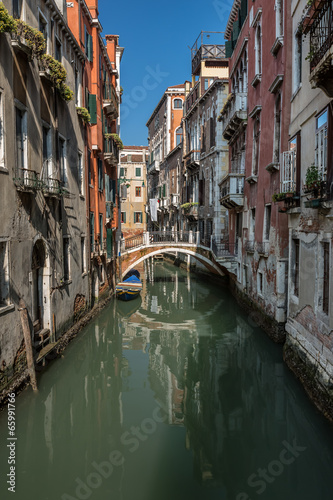 Fototapeta Naklejka Na Ścianę i Meble -  Typical Canal, Bridge and Historical Buildings in Venice, Italy