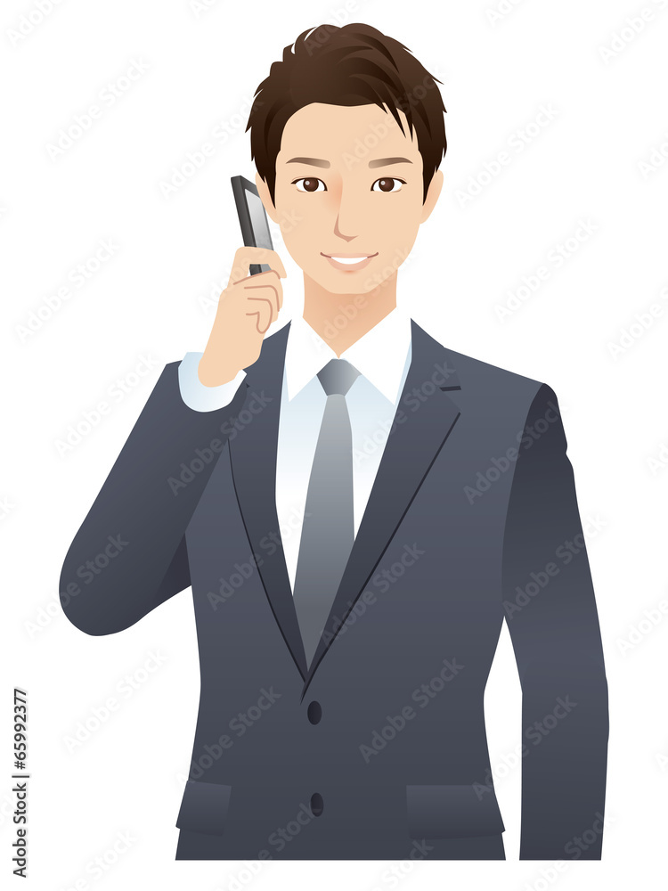 若いビジネスマン　携帯電話