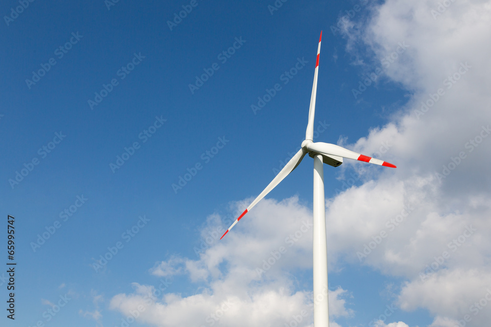 Wind turbine for clean energy production with blue sky Wind turbine for clean energy production with blue sky