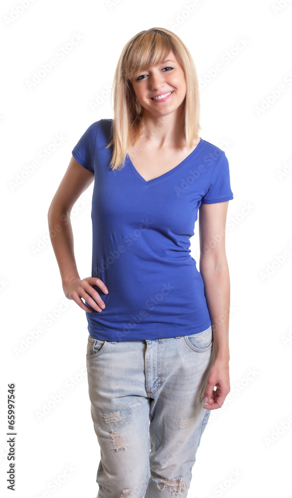 Obraz premium Standing woman with dark eyes and blue jeans