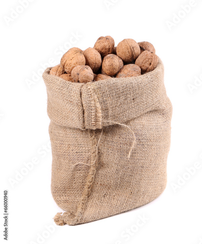 Walnuts in burlap bag.