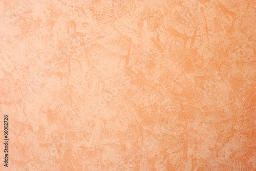 Cement wall background, orange colored.
