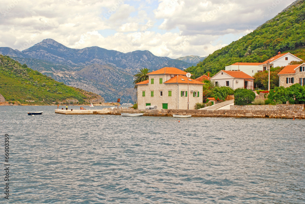 Old fishing village with pier, Kotor Bay, Montenegro.