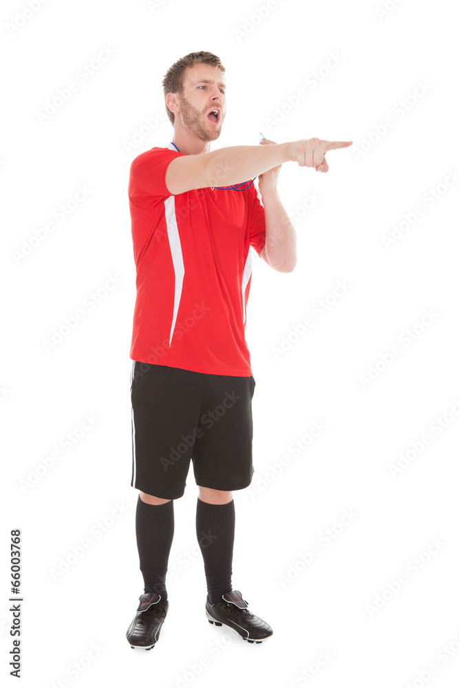 Referee Pointing While Holding Whistle Referee Pointing While Holding Whistle