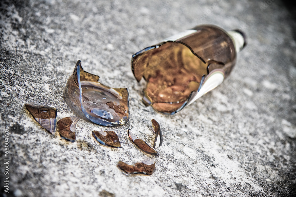 Shattered brown beer bottle Shattered brown beer bottle