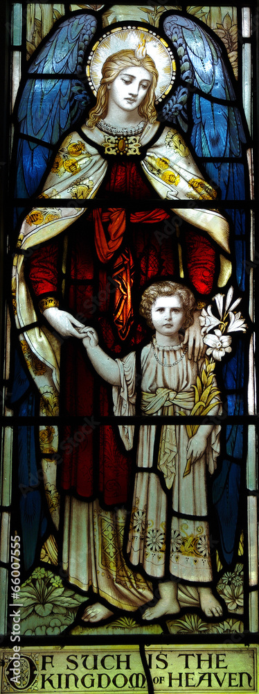 Angels with a young Mary in stained glass
