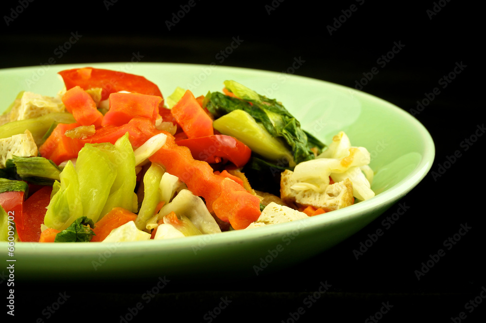 Close up vegetable boiled on black background Close up vegetable boiled on black background
