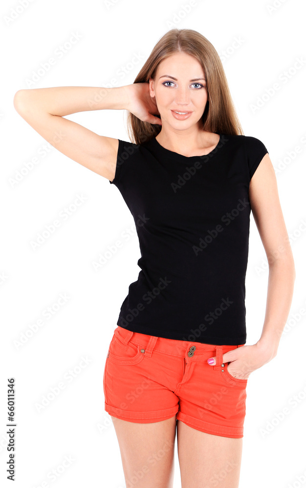 Beautiful young girl in shorts and t-shirt isolated on white