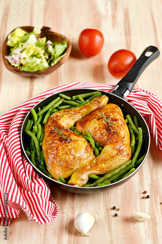 Roasted chicken legs with green beans