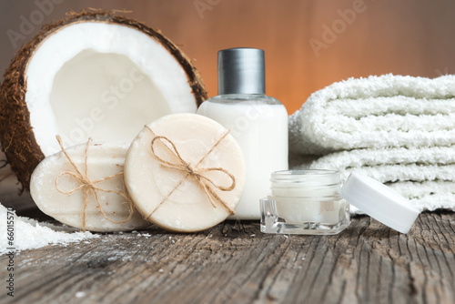 Fotobehang Bars of soap, coconut and face cream-spa setting