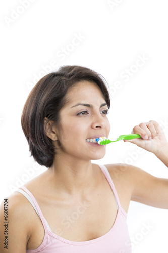Attractive Woman Brushing Teeth