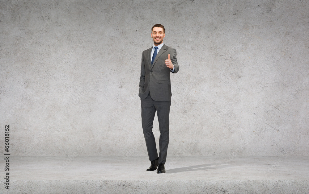 Fototapeta premium handsome businessman showing thumbs up