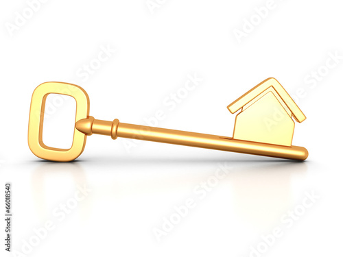 Golden home key with house silhouette