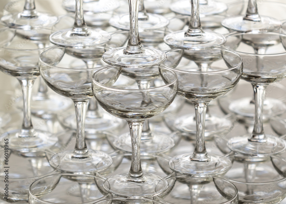 Pyramid holiday of champagne glasses on table in party Pyramid holiday of champagne glasses on table in party