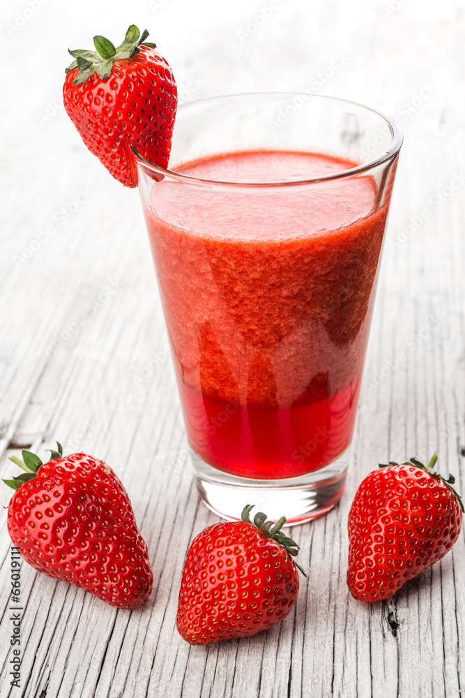 Fresh strawberry drink on wood background Fresh strawberry drink on wood background
