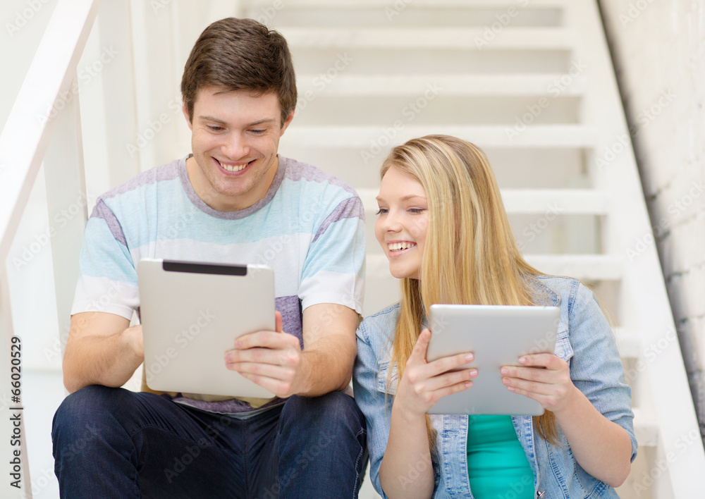 smiling students with tablet pc computer smiling students with tablet pc computer