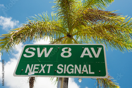 Street sign marking the 8th street in Little Havana, Miami