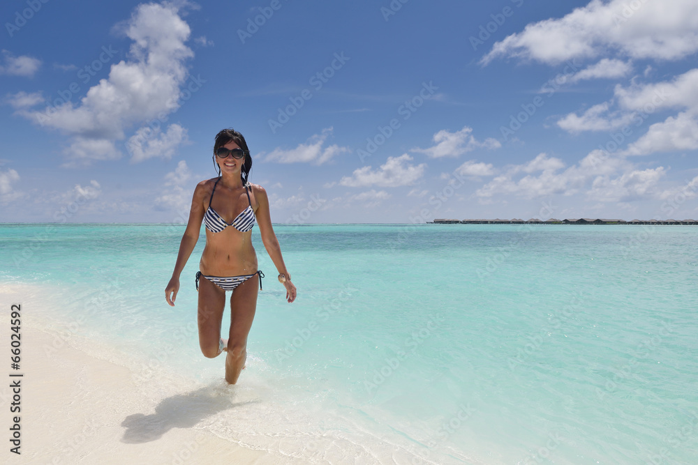 beautiful young woman  on beach have fun and relax