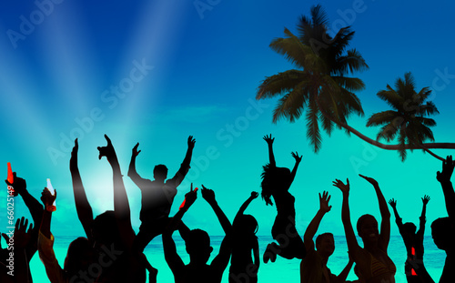 Silhouettes of Young People Celebrating on a Beach