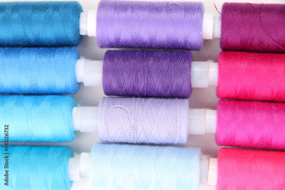 Multicolor sewing threads background Multicolor sewing threads background