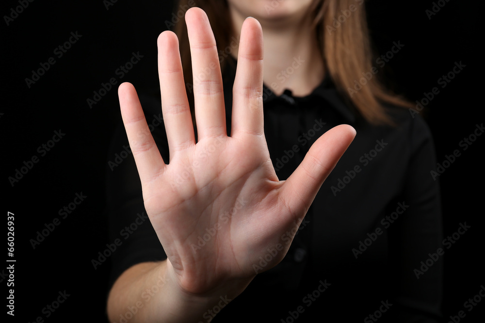 Fototapeta premium Human hand on black background