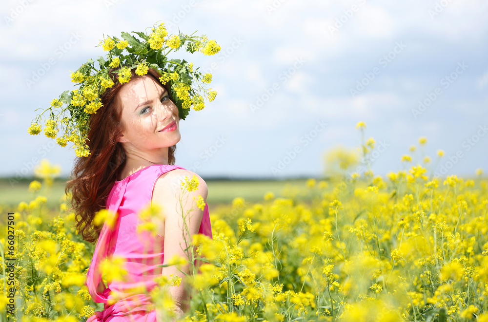 Beautiful young woman in flower field Beautiful young woman in flower field