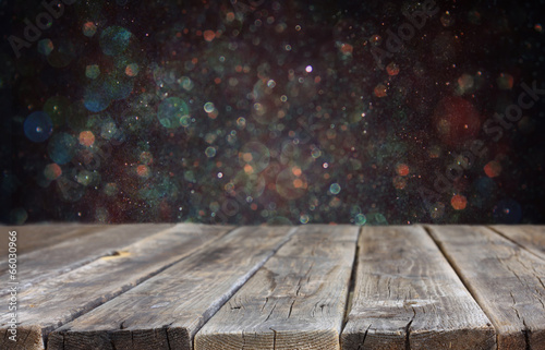 rustic wooden boards and bokeh lights background. ready for prod
