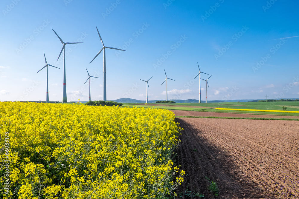 Rural landscape with windwheels seen in Germany Rural landscape with windwheels seen in Germany